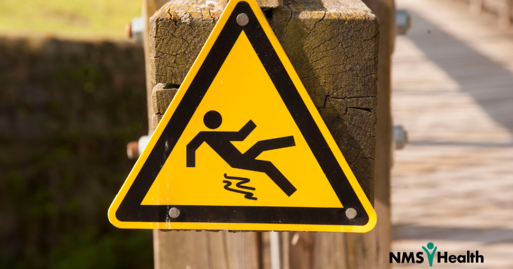 Caution sign with slipping figure