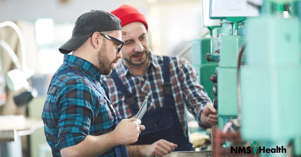 Two men in hats at work